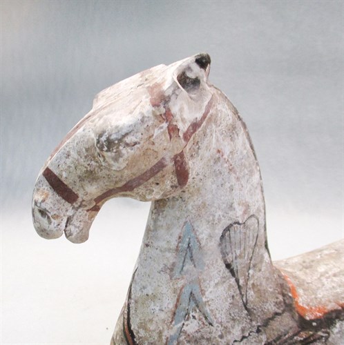 Lot 10 - A painted pottery model of a horse, Han dynasty