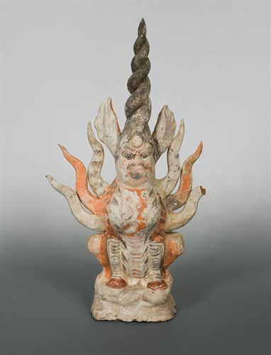 Lot 21 - A painted pottery figure of an earth spirit Zhenmushou, Tang dynasty