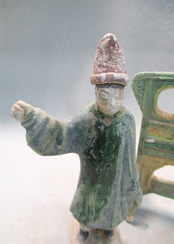 Lot 61 - A set of model furniture - a cupboard, stove, chest, and screen with one servant, Ming dynasty