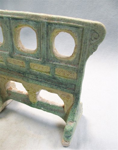 Lot 61 - A set of model furniture - a cupboard, stove, chest, and screen with one servant, Ming dynasty