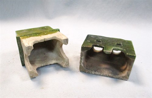 Lot 61 - A set of model furniture - a cupboard, stove, chest, and screen with one servant, Ming dynasty