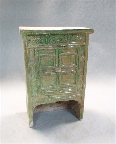 Lot 61 - A set of model furniture - a cupboard, stove, chest, and screen with one servant, Ming dynasty