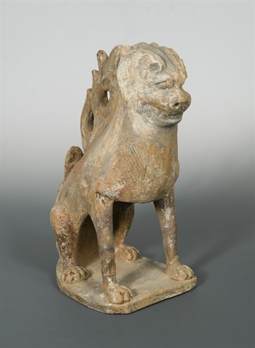 Lot 22 - A pottery earth spirit, Tang dynasty