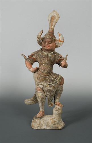 Lot 23 - A Tang dynasty pottery  model of a  Lokapala