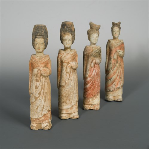 Lot 16 - A group of four terracotta figures of ladies