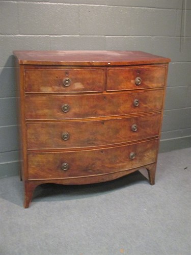 Lot 325 - A regency mahogany bowfronted chest of drawers,...