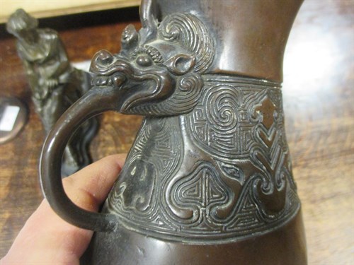 Lot 36 - Oriental bronze vase, a seated classical...