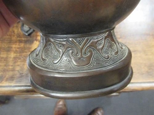 Lot 36 - Oriental bronze vase, a seated classical...