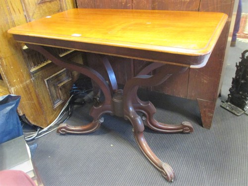 Lot 438 - A Victorian mahogany side table with scroll...