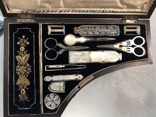 Lot 417 - A late 19th century French birdseye maple Palais Royale type sewing box in the form of a harpsichord