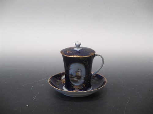 Lot 62 - A Russian Chocolate cup, cover and stand, the...