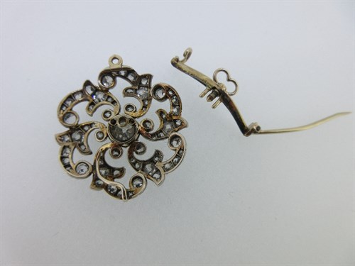 Lot 456 - A late 19th century circular diamond brooch / pendant