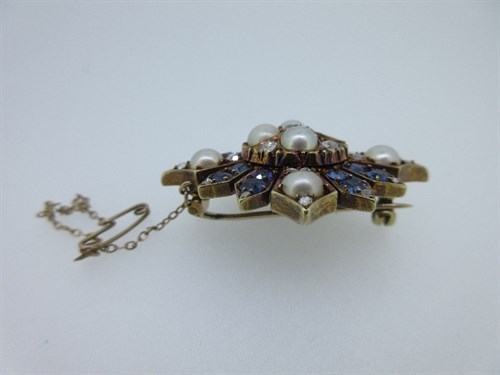 Lot 406 - A Victorian diamond, sapphire and half pearl brooch