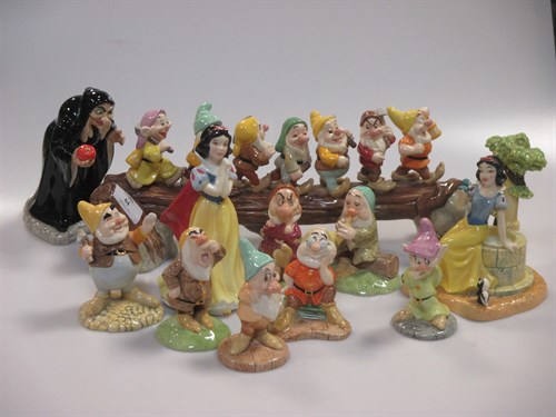 Lot 64 - Royal Doulton Snow White and the seven Dwarfs...
