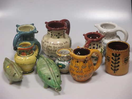 Lot 4 - A Bideford pottery puzzle jug and other items...