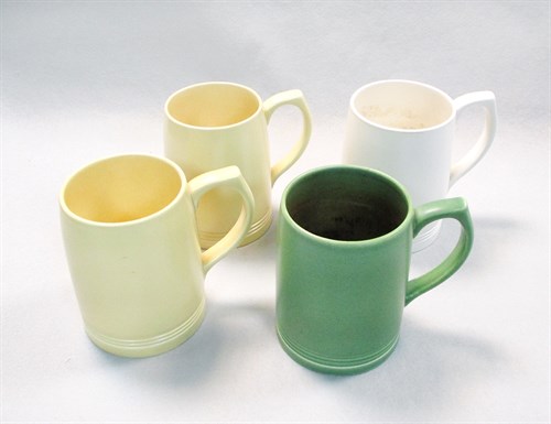 Lot 39 - Keith Murray for Wedgwood, four cylindrical tankards