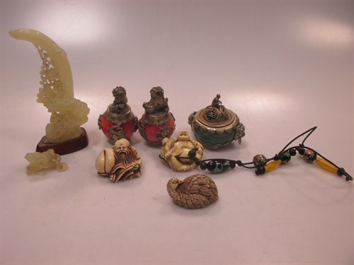 Lot 109 - Three resin netsuke, an onyx ornament of birds...