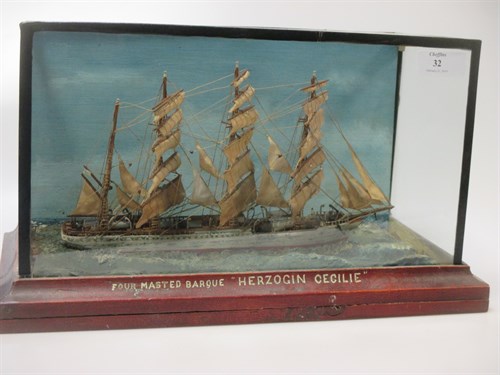 Lot 32 - A cased model of a four masted barque...