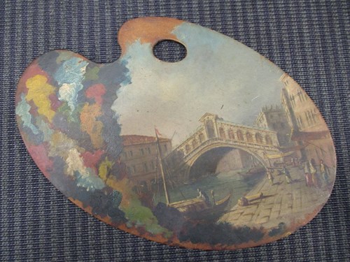 Lot 233 - An artist's palette, painted with a scene of...