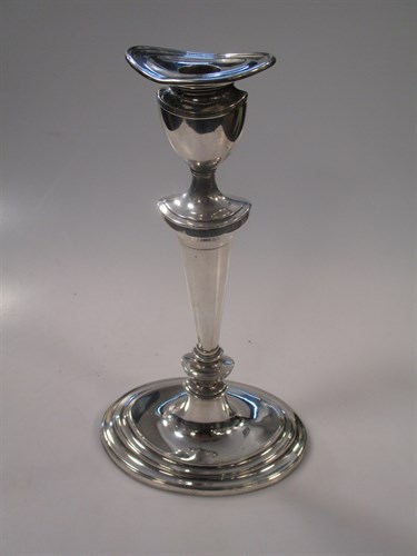 Lot 162 - A George III style silver candlestick, 30cm high