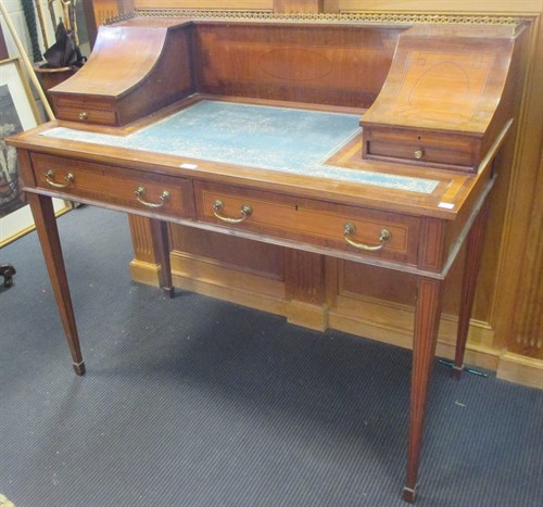 Lot 367 - An Edwardian leather inset mahogany writing...