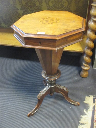 Lot 279 - A Victorian walnut sewing table of octagonal...