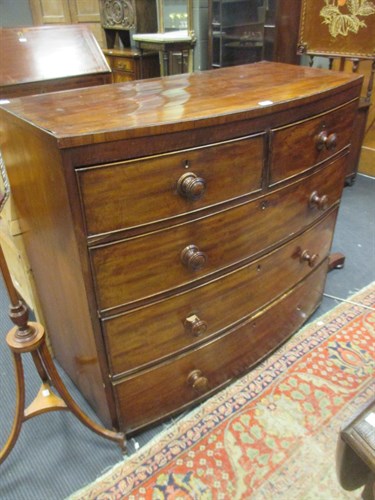 Lot 500 - A Regency mahogany bow front chest of drawers,...