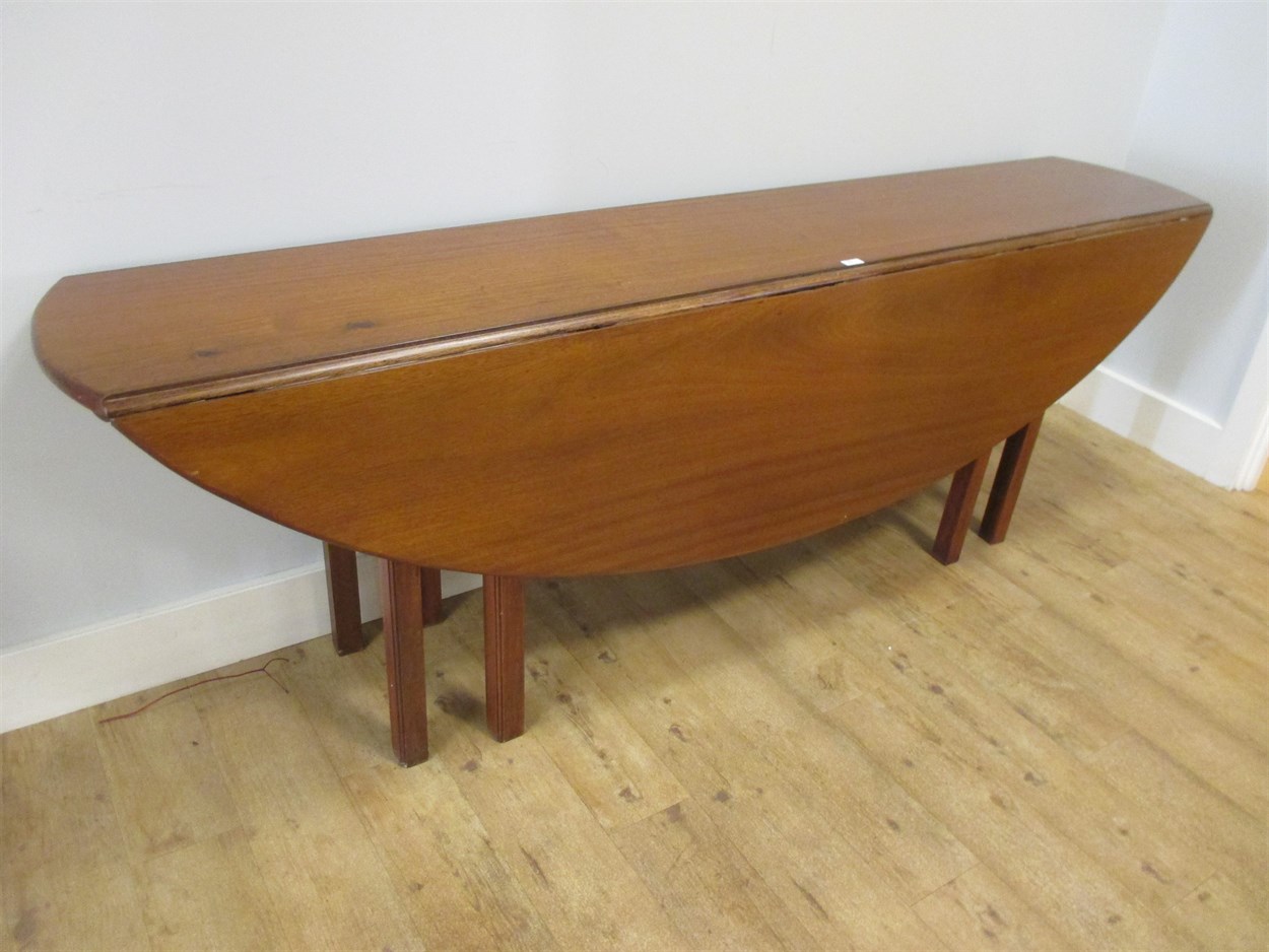 Lot 374 - A 19th century mahogany Irish wake table, 74 x...