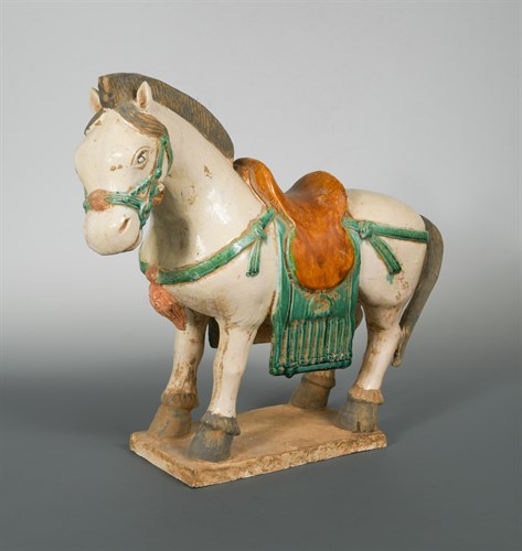 Lot 63 - A large Ming Dynasty  Sancai glazed horse