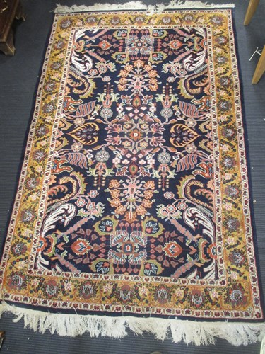 Lot 553 - A Persian style rug 202 x 128cm