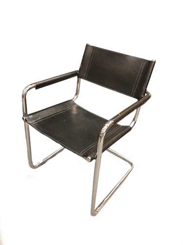 Lot 203 - Mobilia Italia, a tubular chrome and black leather cantilever armchair