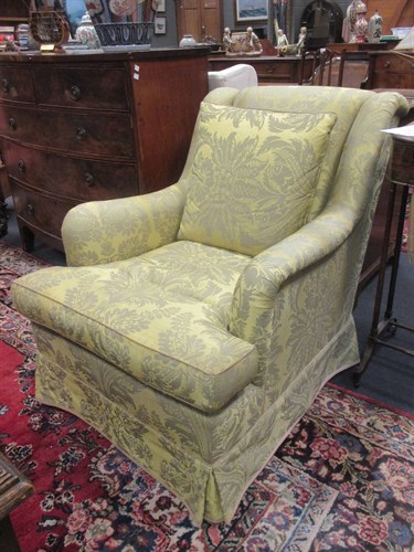 Lot 243 - A modern armchair in yellowed green damask...