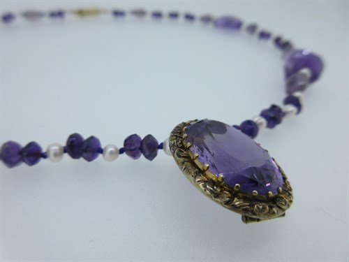 Lot 441 - An amethyst and seed pearl necklace with removable Victorian amethyst centrepiece