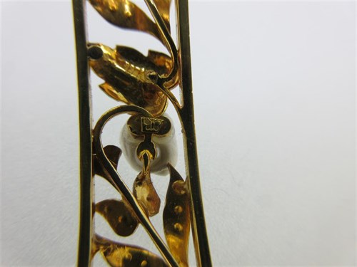 Lot 342 - A pair of fine 19th century hinged bangles with enamel and seed pearls