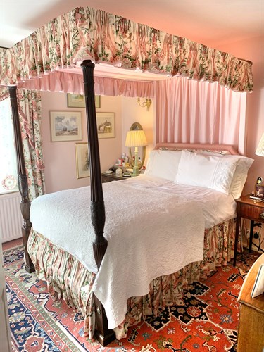 Lot 480 - A late 18th century mahogany four post bed, c 1790