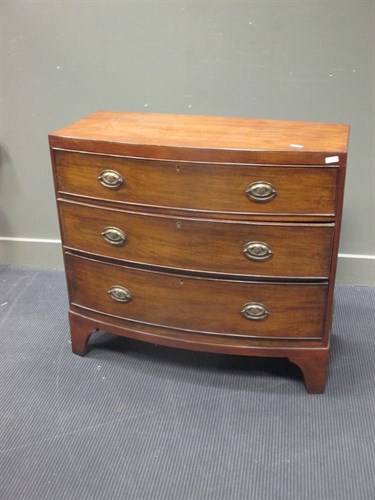 Lot 504 - A Regency mahogany bow front chest of drawers...