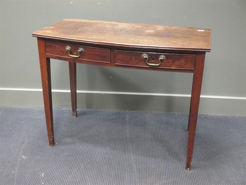 Lot 475 - A mahogany bow front table 91cm wide