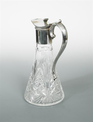 Lot 144 - A 20th century silver mounted cut glass claret jug