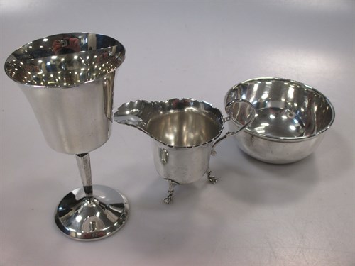 Lot 276 - An silver cream jug, a silver goblet and a...