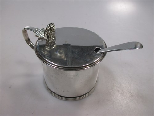 Lot 243 - A silver drum mustard with associated spoon...