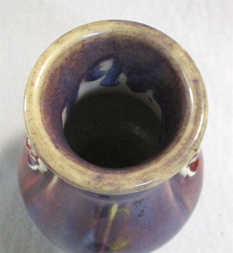 Lot 122 - A flambe glazed archaistic Hu shape vase, 19th century