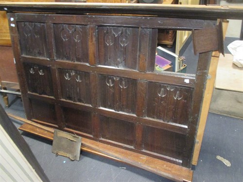 Lot 415 - An oak linenfold carved panelled overmantel,...