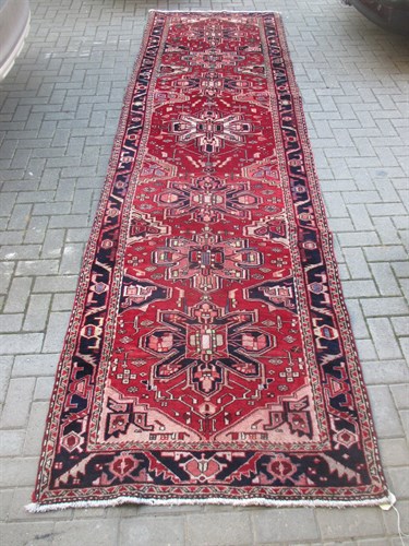 Lot 548 - An Azarabaijan rug 410 x 115cm