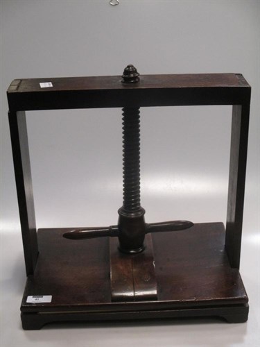 Lot 41 - An early 19th century mahogany table top press...