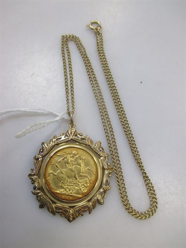 Lot 211 - A curb link chain supporting a 9ct gold...