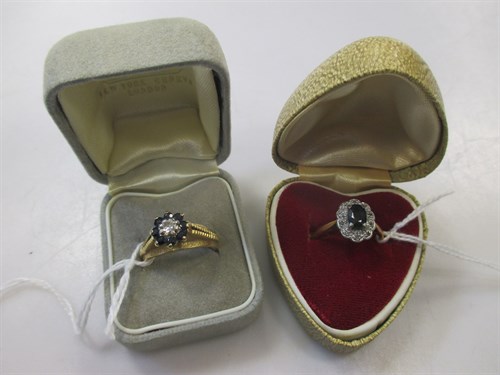 Lot 200 - Two 18ct gold sapphire and diamond cluster...