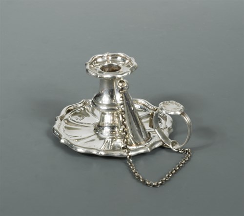 Lot 62 - A George IV silver child's chamberstick and snuffer