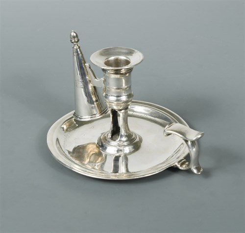 Lot 36 - A George II silver chamberstick with a later snuffer