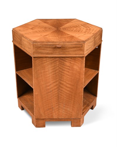 Lot 140 - An Art Deco walnut hexagonal book table