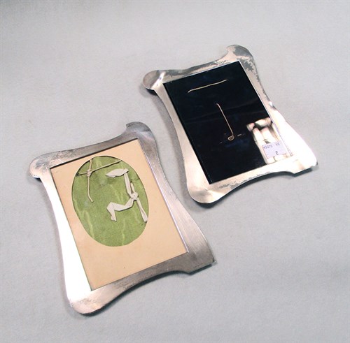 Lot 128 - A pair of George V silver photograph frames